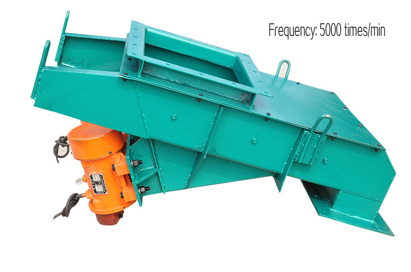 What is the frequency of the vibrating feeder?