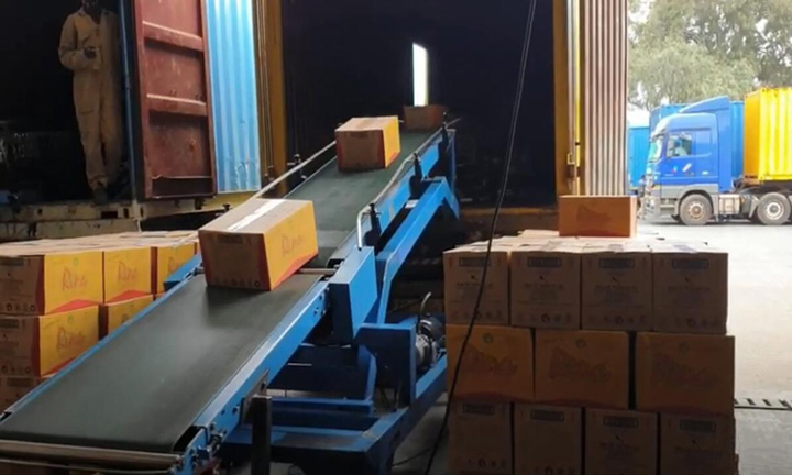 What is a truck loading unloading belt conveyor?