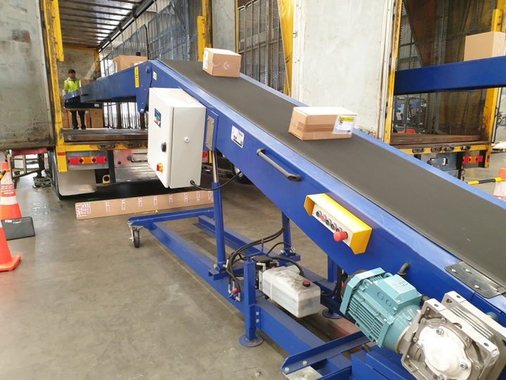 What is a truck loading unloading belt conveyor?